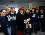 Joyce Eichhorn Ames, '49, poses with members of Kappa Kappa Gamma.