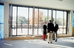 Mr. and Mrs. Ames view the new library patio.