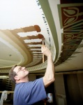 Paiting the second floor ceiling. by Marc Featherly