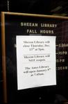 A sign marks the closing of Sheean Library.